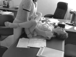 The boss fucks his tiny secretary on the office table and videos it on hidden camera